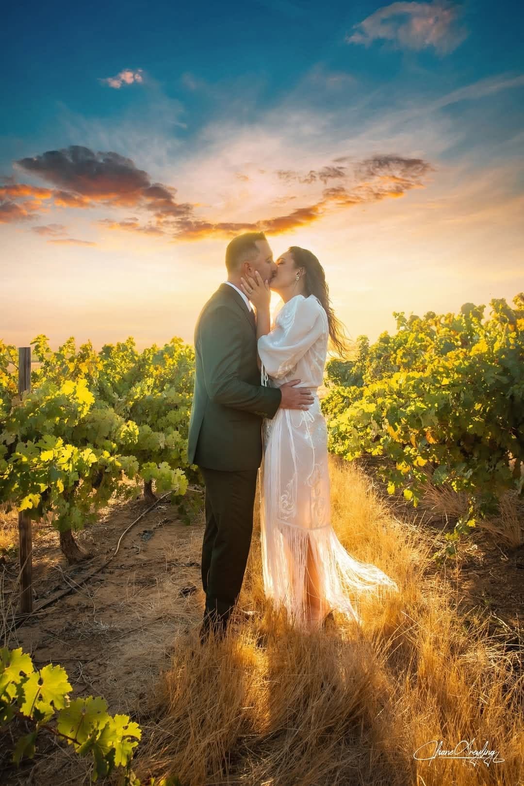 Couple at golden-hour sunset in the Nassau Hartklop vineyard